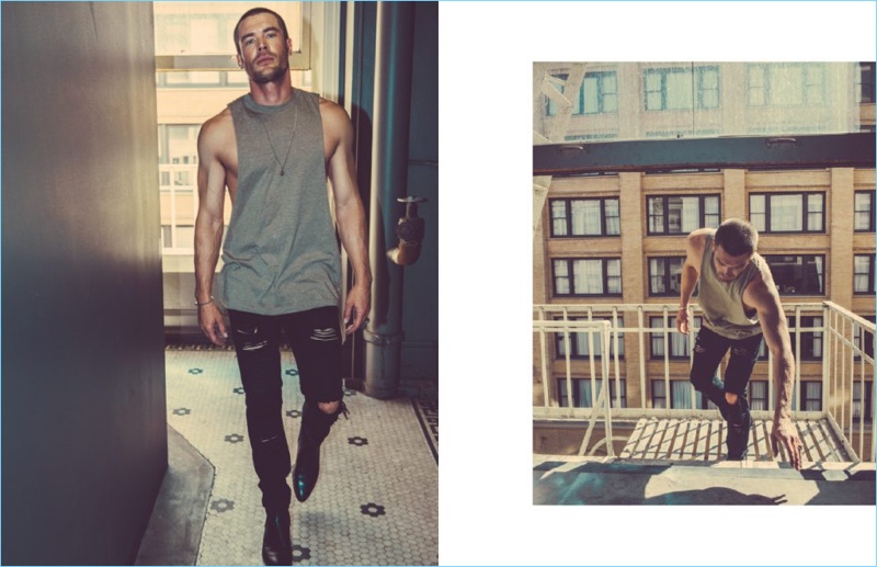 A sporty vision, Charlie Weber rocks a Slow Build Heavy Grind tank with ripped Stampd denim jeans and Dior Homme boots.