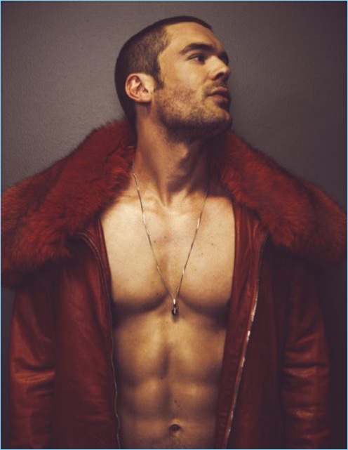 Charlie Weber rocks a red Marc Jacques Burton bomber jacket.