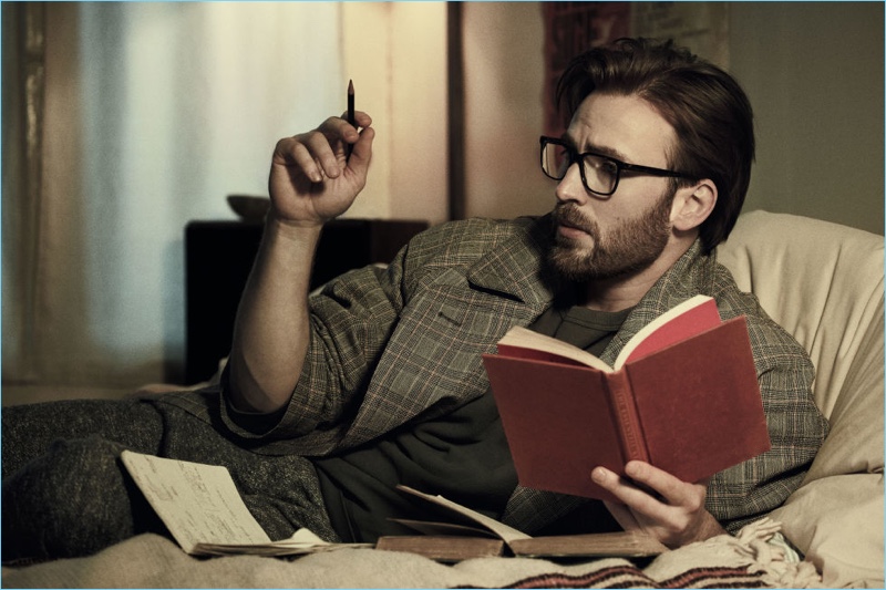 Donning glasses and reading a book, Chris Evans appears in a photo shoot for Esquire.