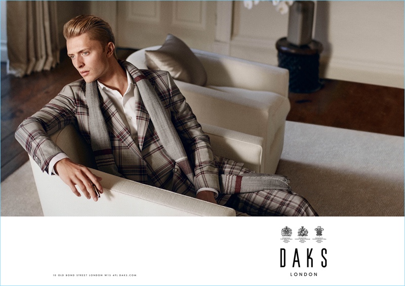 Making a sharp impression, Max Rendell dons a plaid suit for Daks' spring-summer 2017 campaign.