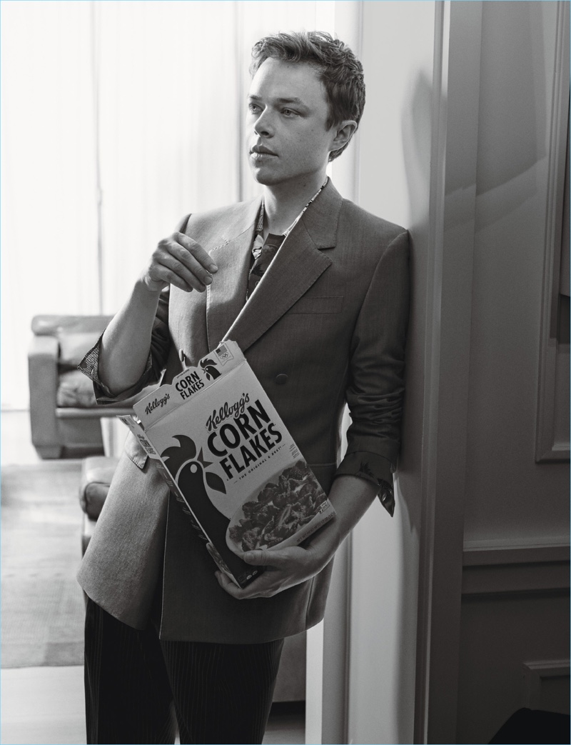Enjoying a box of Corn Flakes, Dane DeHaan wears a Cerruti 1881 sport coat with a Jeffrey Rüdes shirt and Lanvin trousers. » Dane DeHaan Covers W Magazine, Makes a Leggy Statement Enjoying a box of Corn Flakes, Dane DeHaan wears a Cerruti 1881 sport coat with a Jeffrey Rüdes shirt and Lanvin trousers.