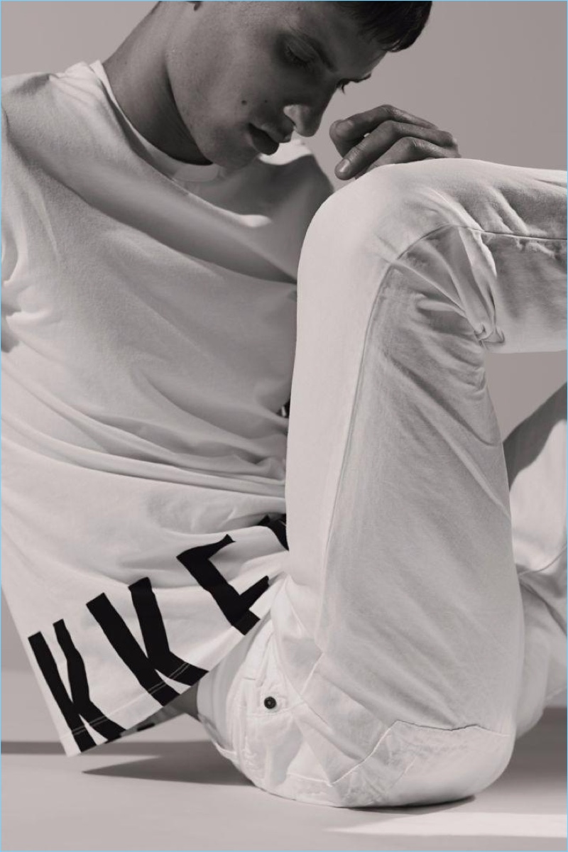 Mel Bles photographs David Trulik in a white summer outfit for Dirk Bikkembergs' latest advertising campaign.