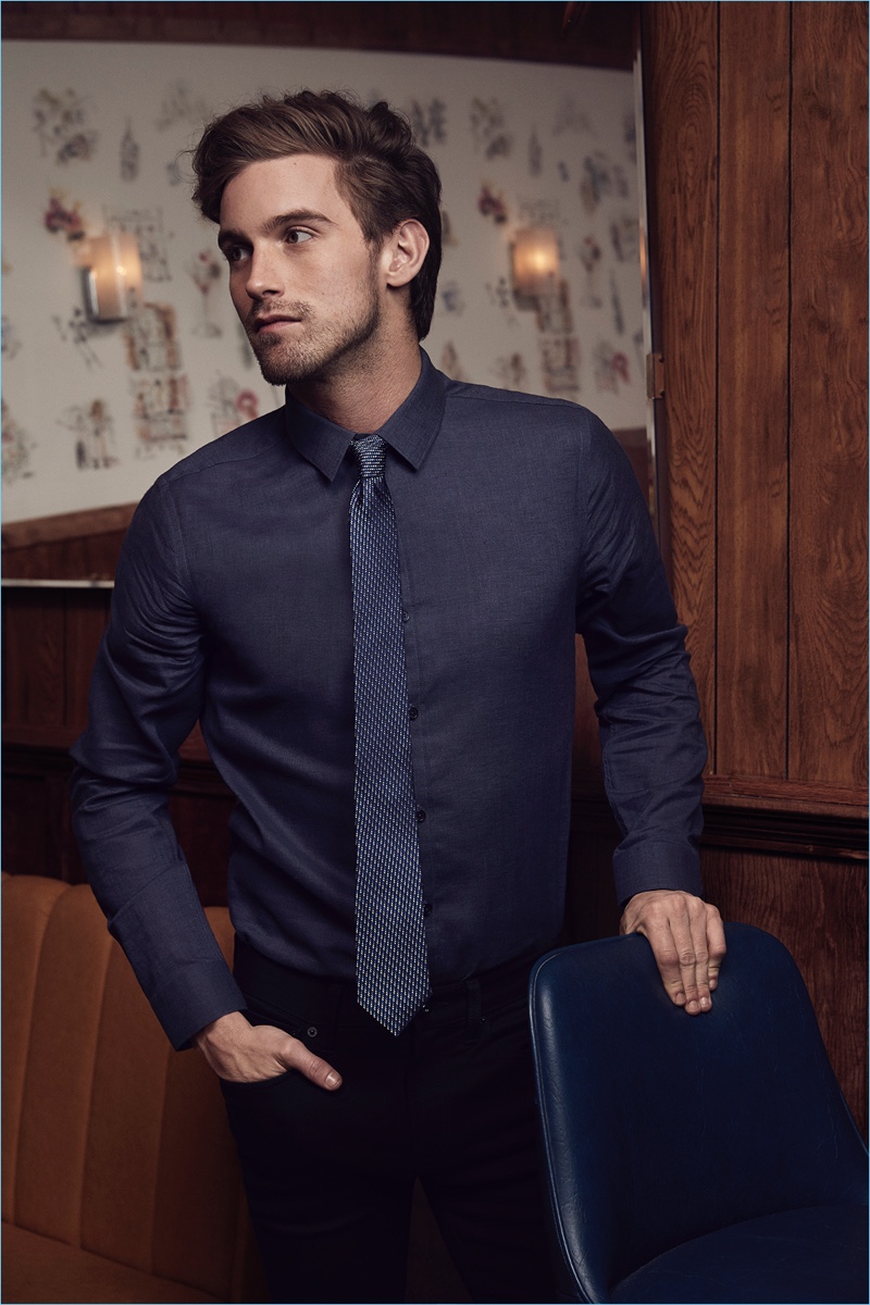 American model RJ King showcases one of Express' smart shirt and tie combos. 