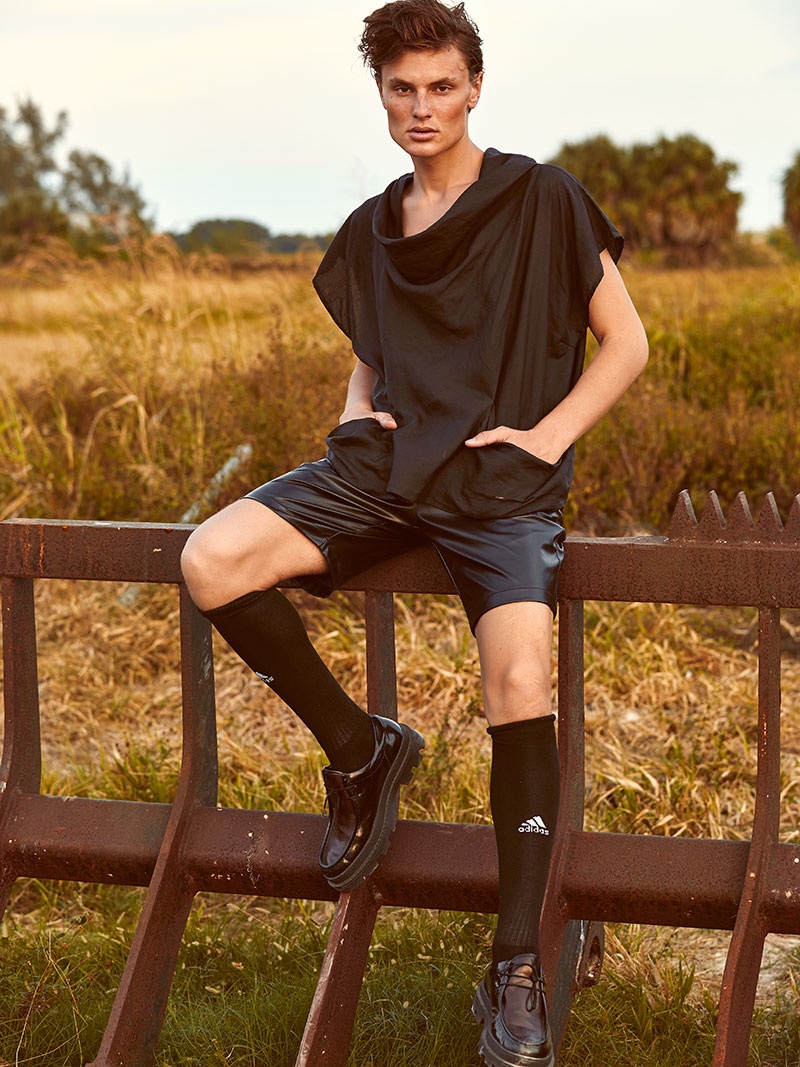 Vanya wears top Martin Margiela, shorts Dsquared2, socks Adidas, and shoes Carven.