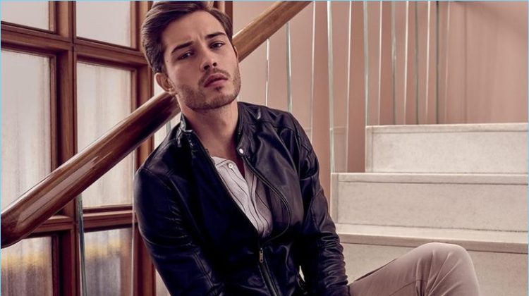 Delivering his best angles, Francisco Lachowski sports a leather jacket with slim-fit cargo pants.