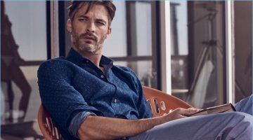 Ben Hill Reunites with J.Hilburn for Sleek Summer of Style Relaxing, Ben Hill wears trousers and a navy chambray shirt with a star print from J.Hilburn.