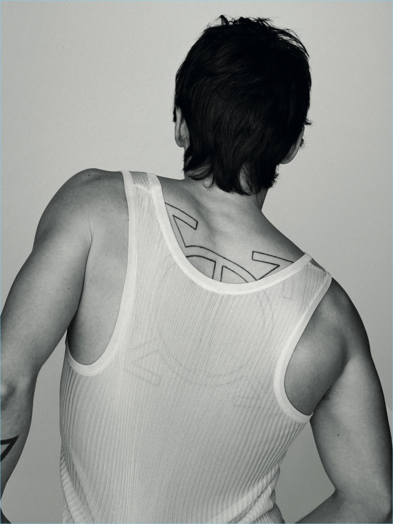 Starring in a new shoot, Jared Leto reveals a hint of his back tattoo.
