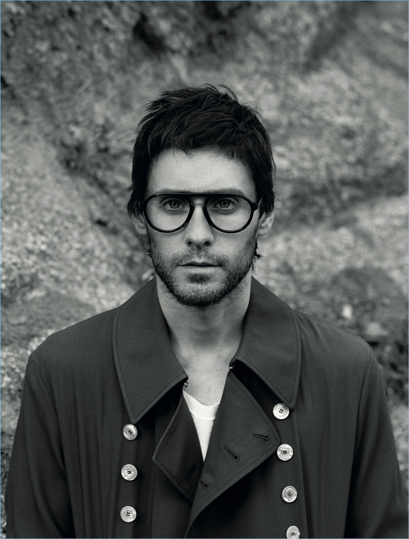 Appearing in a photo shoot for L'Officiel Hommes Paris, Jared Leto sports a Gucci coat and Carrera glasses.