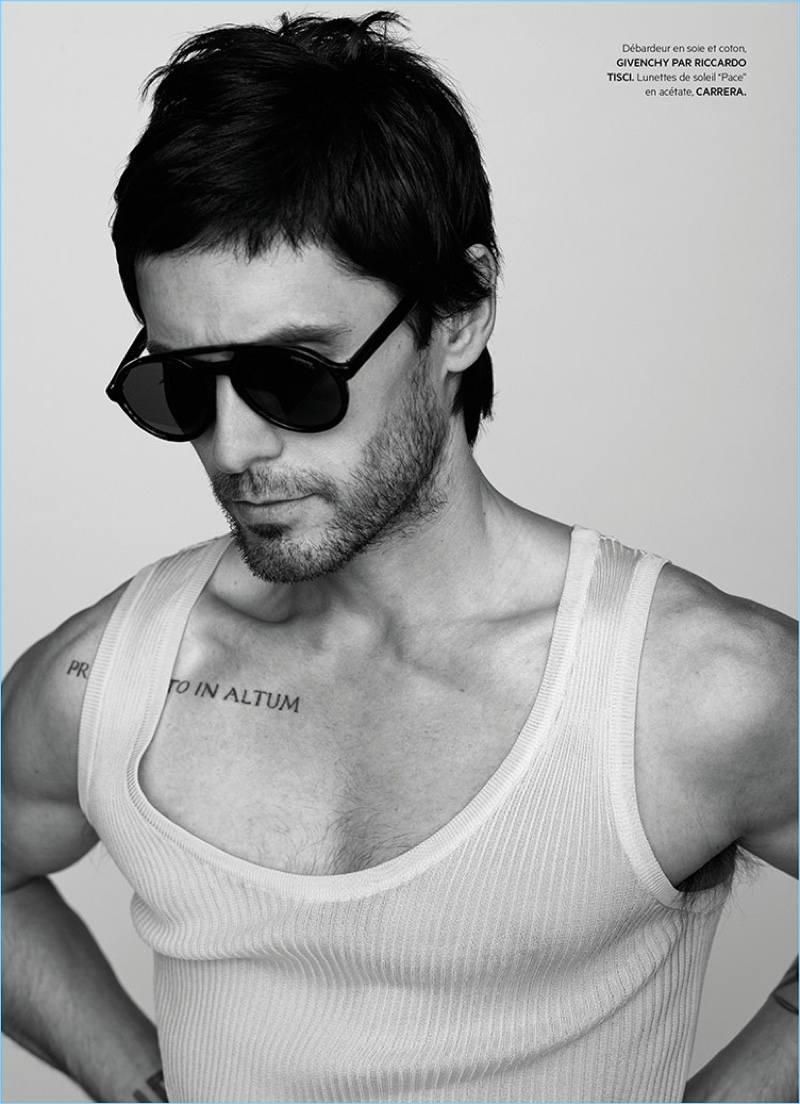 Thirty Seconds to Mars frontman Jared Leto rocks a Givenchy wifebeater with Carrera sunglasses.