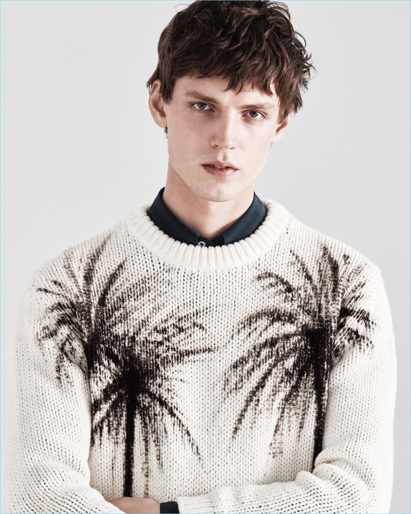 A crewneck sweater is dressed up with images of palm trees for Jeffrey Rüdes' fall-winter 2017 collection.