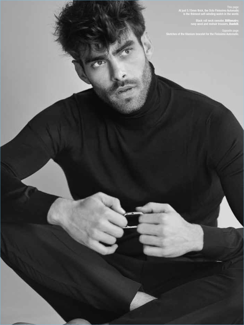 Appearing in a photo shoot for Revolution magazine, Jon Kortajarena wears a Billionaire turtleneck sweater with Dunhill trousers.