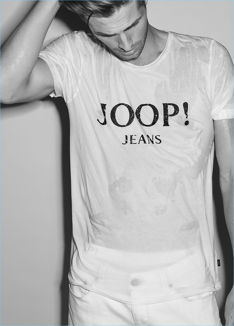 British model Edward Wilding rocks a wet t-shirt for Joop! Jeans' spring-summer 2017 lookbook.