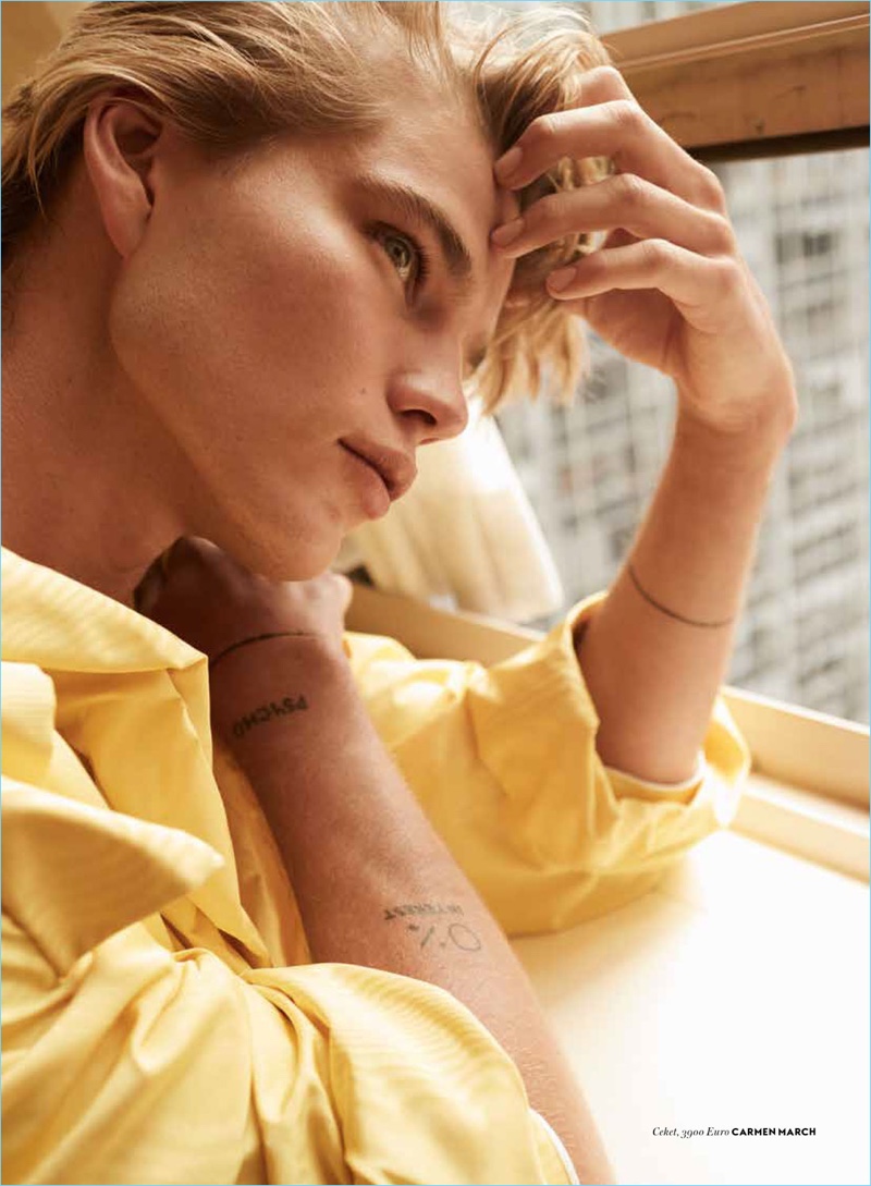 Sporting a yellow Carmen March top, Jordan Barrett stars in an editorial for Vogue Turkey.