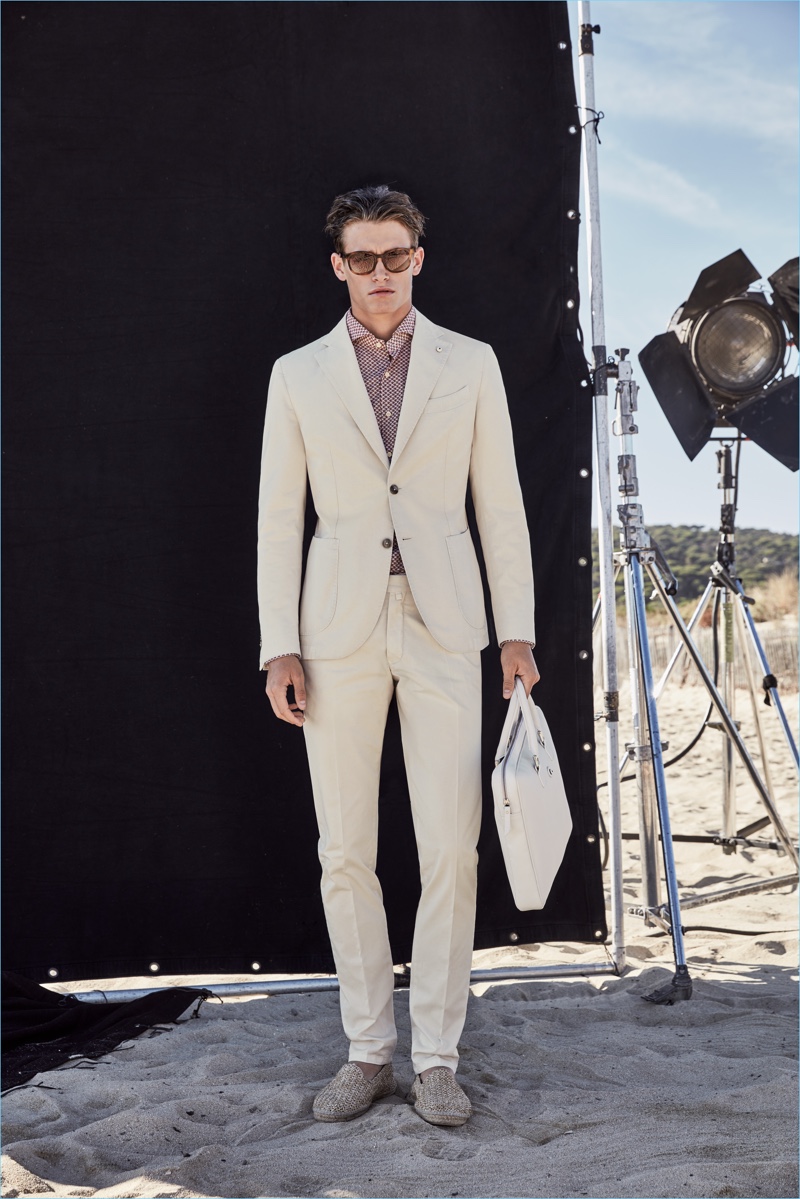 Neutral style reigns as Sascha Wolf wears a tan suiting number from L.B.M. 1911.