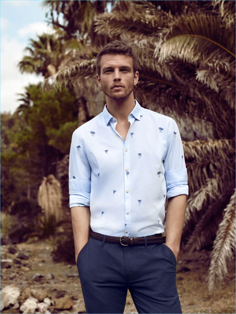Front and center, Benjamin Eidem dons a smart patterned shirt with trousers by Lufian.