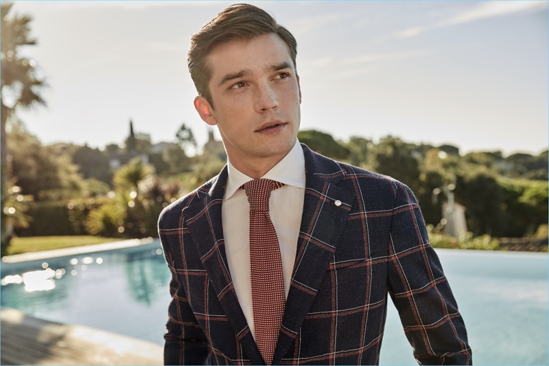 Alexis Petit dons a windowpane print blazer from Luigi Bianchi Mantova's spring-summer 2017 collection.