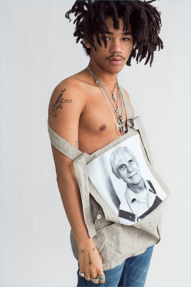 Luka Sabbat wears overalls from Raf Simons' Robert Mapplethorpe collection. He also sports Stella McCartney jeans and his own jewelry. 