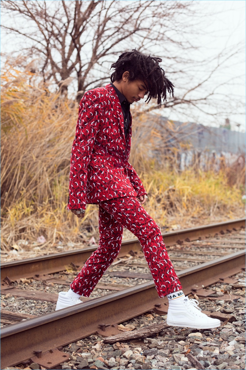 Stepping out, Luka Sabbat wears a printed Dior Homme suit with Vans sneakers.