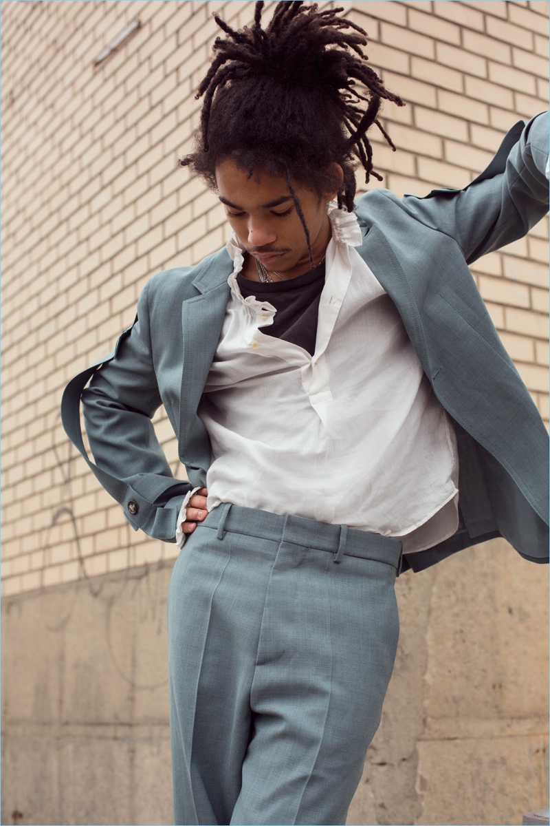 Suited up in Marni, Luka Sabbat wears a Burberry shirt over a Calvin Klein t-shirt.