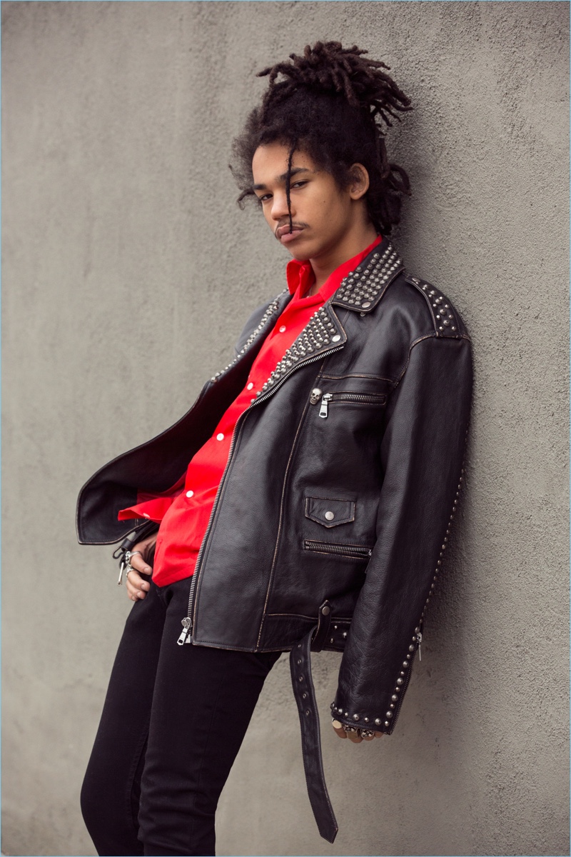 Playing it cool, Luka Sabbat rocks a Gucci leather biker jacket with a vintage shirt and Calvin Klein jeans.