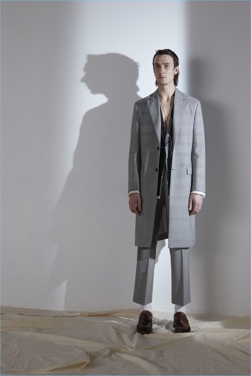 French fashion house Maison Margiela lets out the silhouette of narrow tailoring for fall-winter 2017.