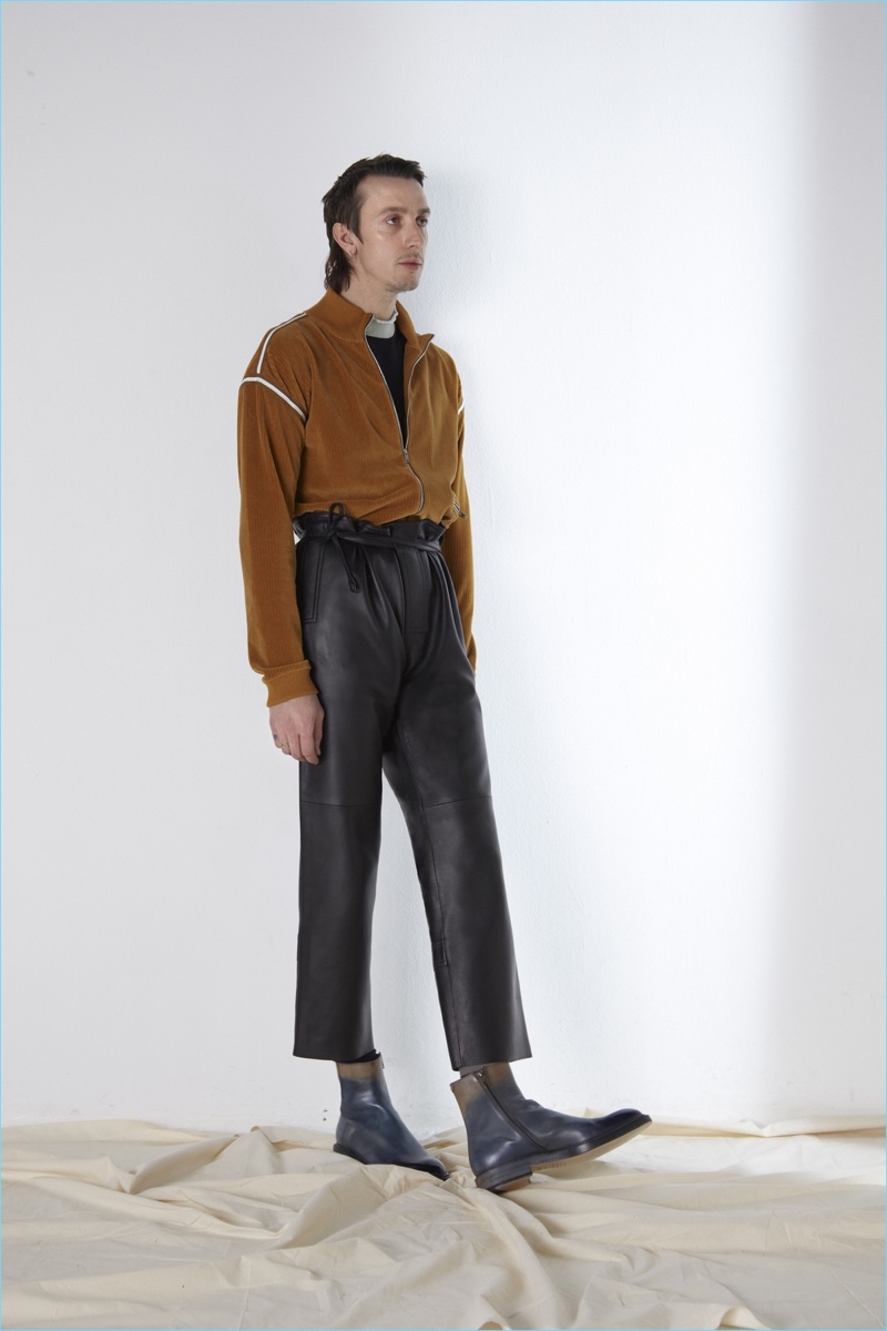 Revisiting leather pants, Maison Margiela turns out a cropped version with a paper bag waist.