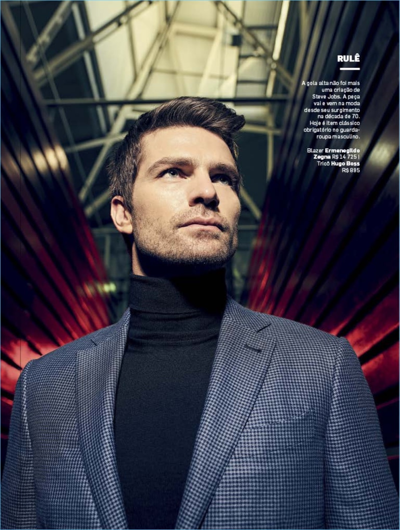 Brazilian model Michael Camiloto sports an Ermenegildo Zegna blazer with a Hugo Boss turtleneck.