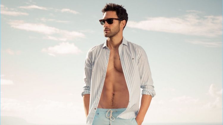 A summer vision, Noah Mills flashes his six-pack as he stars in Pedro del Hierro's spring-summer 2017 campaign.