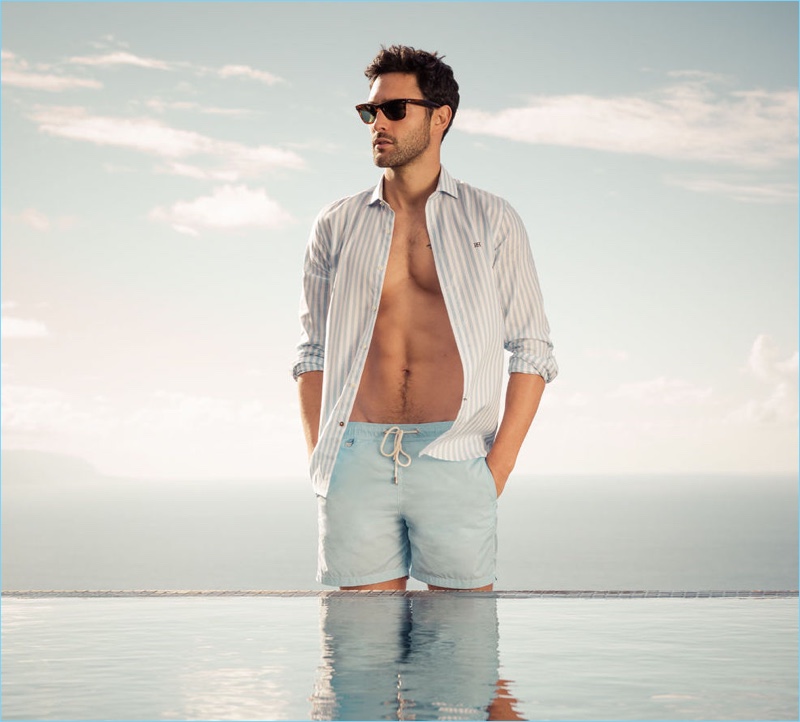 A summer vision, Noah Mills flashes his six-pack as he stars in Pedro del Hierro's spring-summer 2017 campaign.