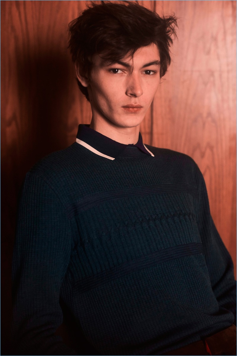 Layering for fall, Orley turns out a textured knit sweater with a smart polo.