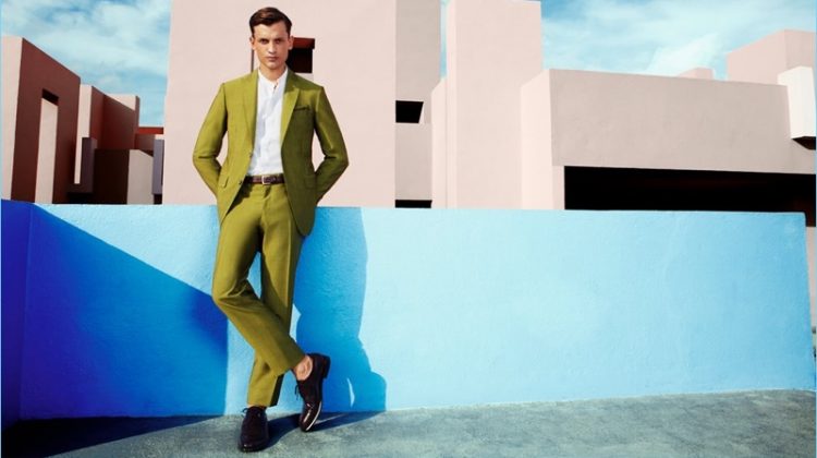 Making a statement in green, Eddie Klint dons a suit from Pal Zileri.