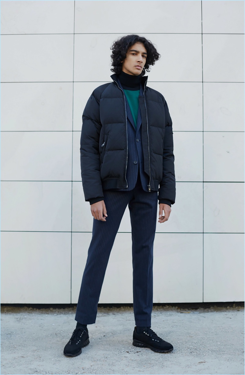 Adding a sporty vibe to a trim suit, Paul & Joe highlights its padded down jacket.
