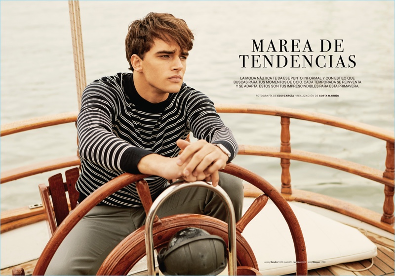 Embracing nautical style, Pepe Barroso Silva wears a striped Sandro sweater with Hermes pants.