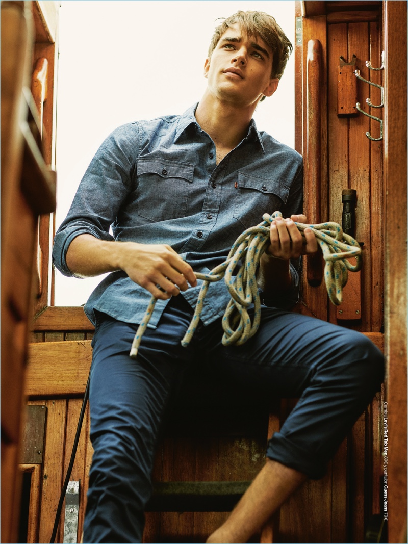 Gravitating towards blue, Pepe Barroso Silva sports a Levi's Red Tab shirt with GUESS pants.