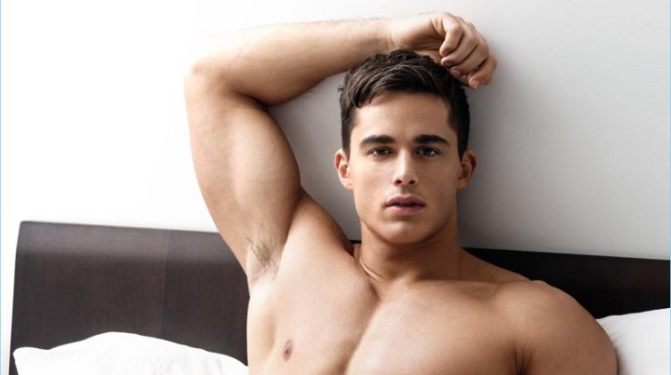 Relaxing in bed, Pietro Boselli sports grey BENCH/ BODY underwear for the brand's 2017 campaign.