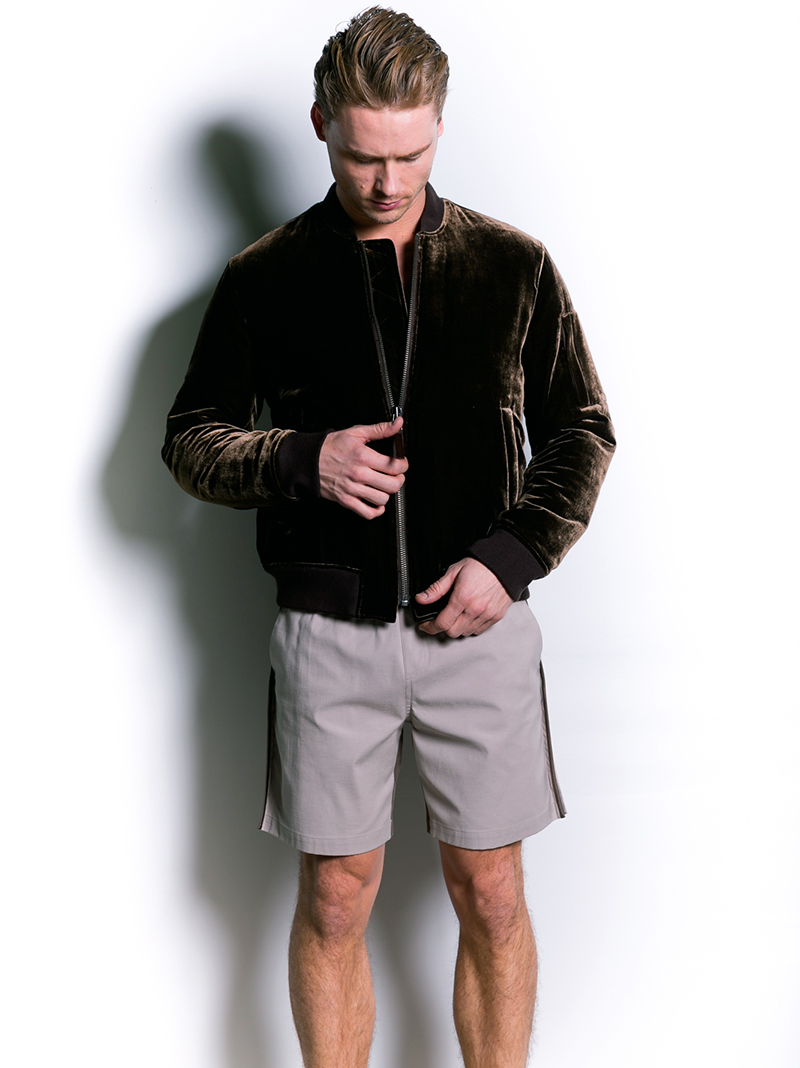 Andrew wears bomber jacket Vince and shorts Thaddeus O’Neil .
