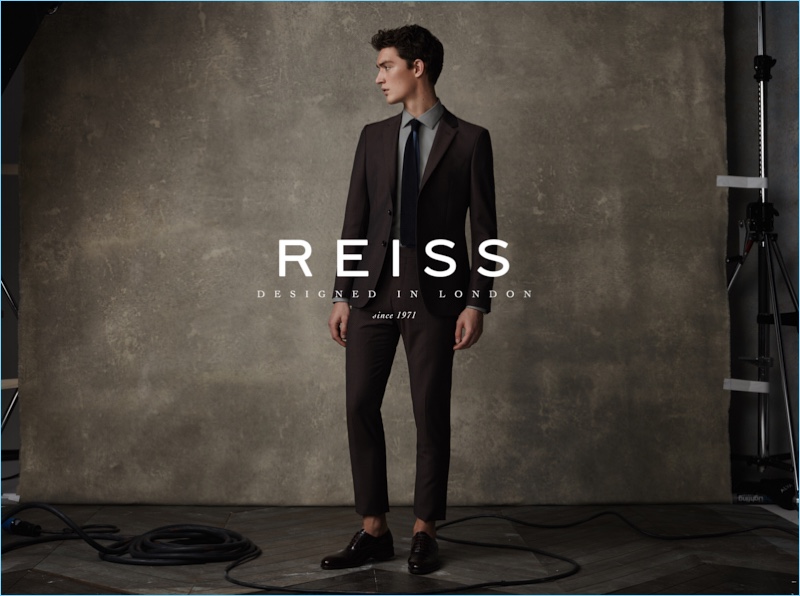 Cutting a sartorial figure, Otto Lotz wears suiting from Reiss for the brand's spring-summer 2017 campaign.