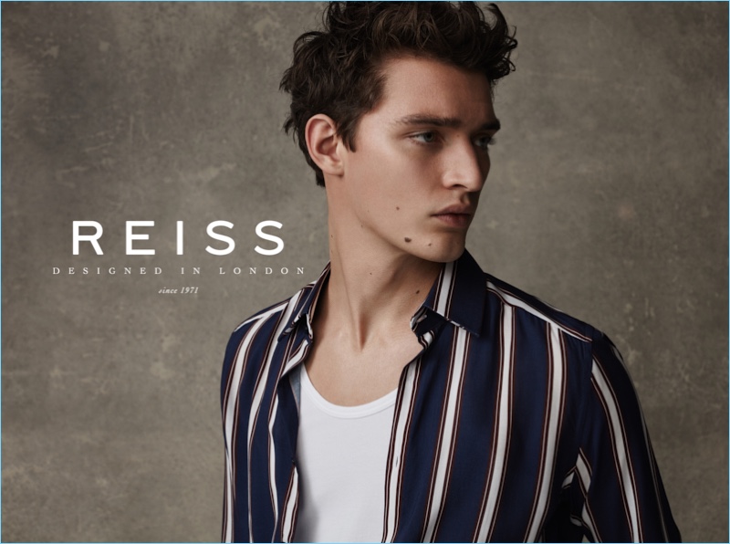 Model Otto Lotz dons a striped shirt for Reiss' spring-summer 2017 campaign.