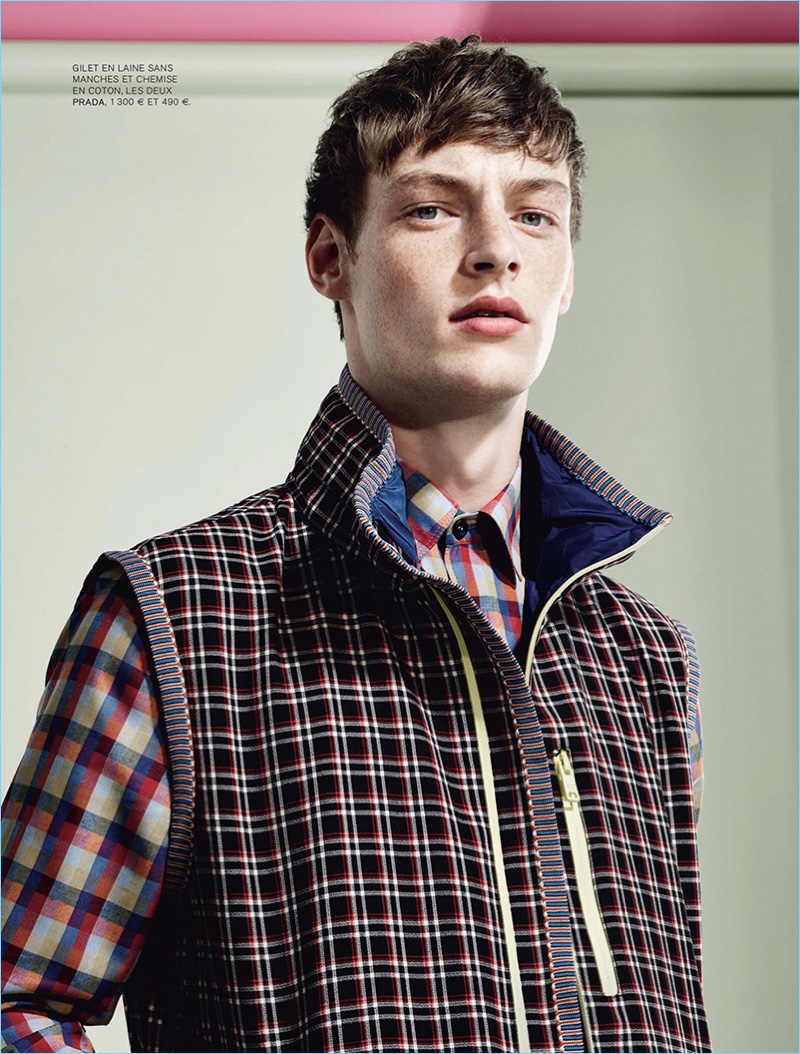 Mixing prints, Roberto Sipos wears preppy spring pieces from Prada.