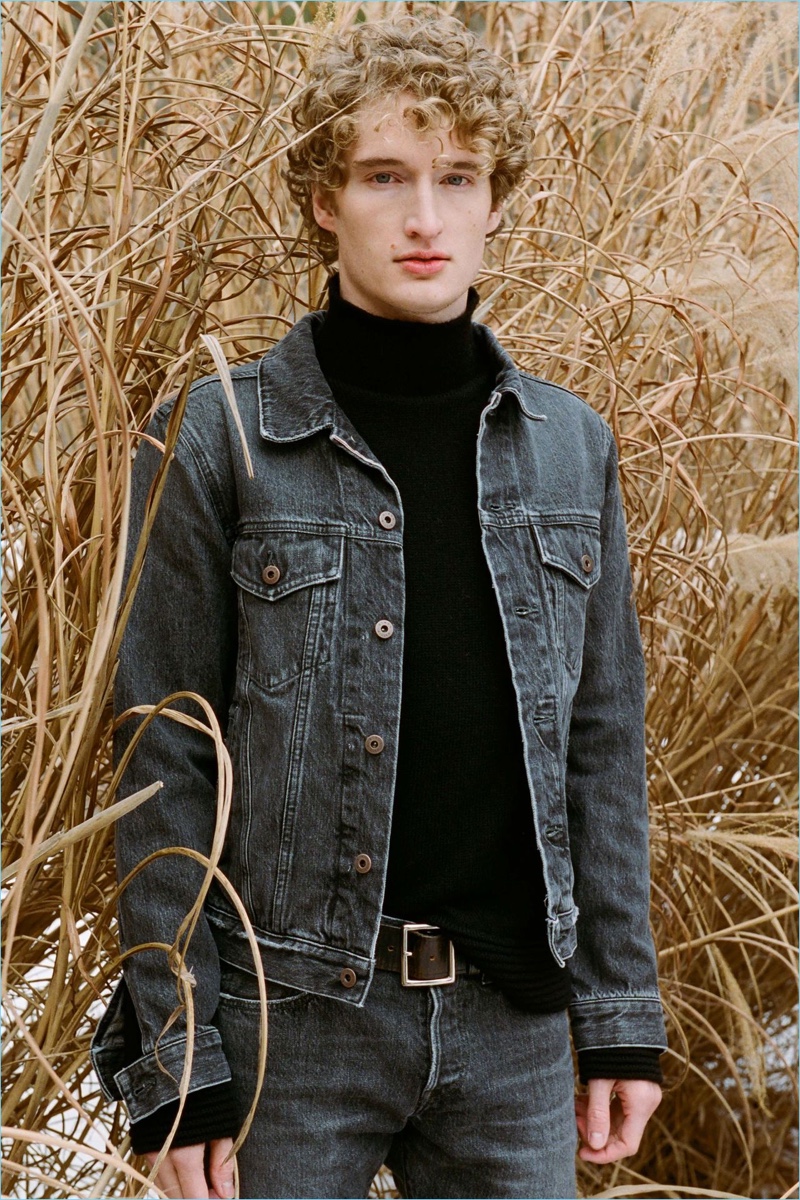 Adding a chic element to double denim, Simon Miller styles its denim jacket and jeans with a turtleneck sweater.