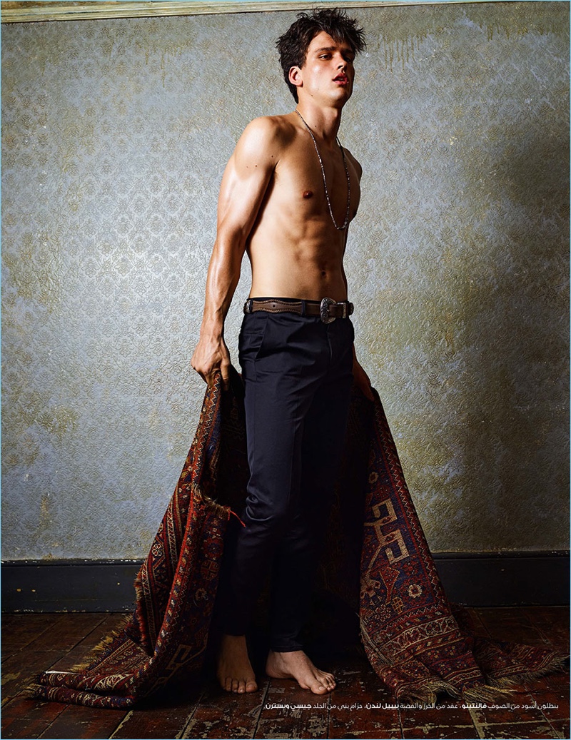 A shirtless Simon Nessman stars in an editorial for H magazine.