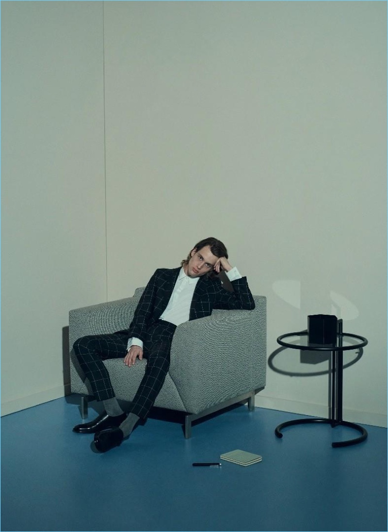Sean Alexander Geraghty photographs Sylvester Ulv in a shirt and windowpane print suit by BOSS Hugo Boss.