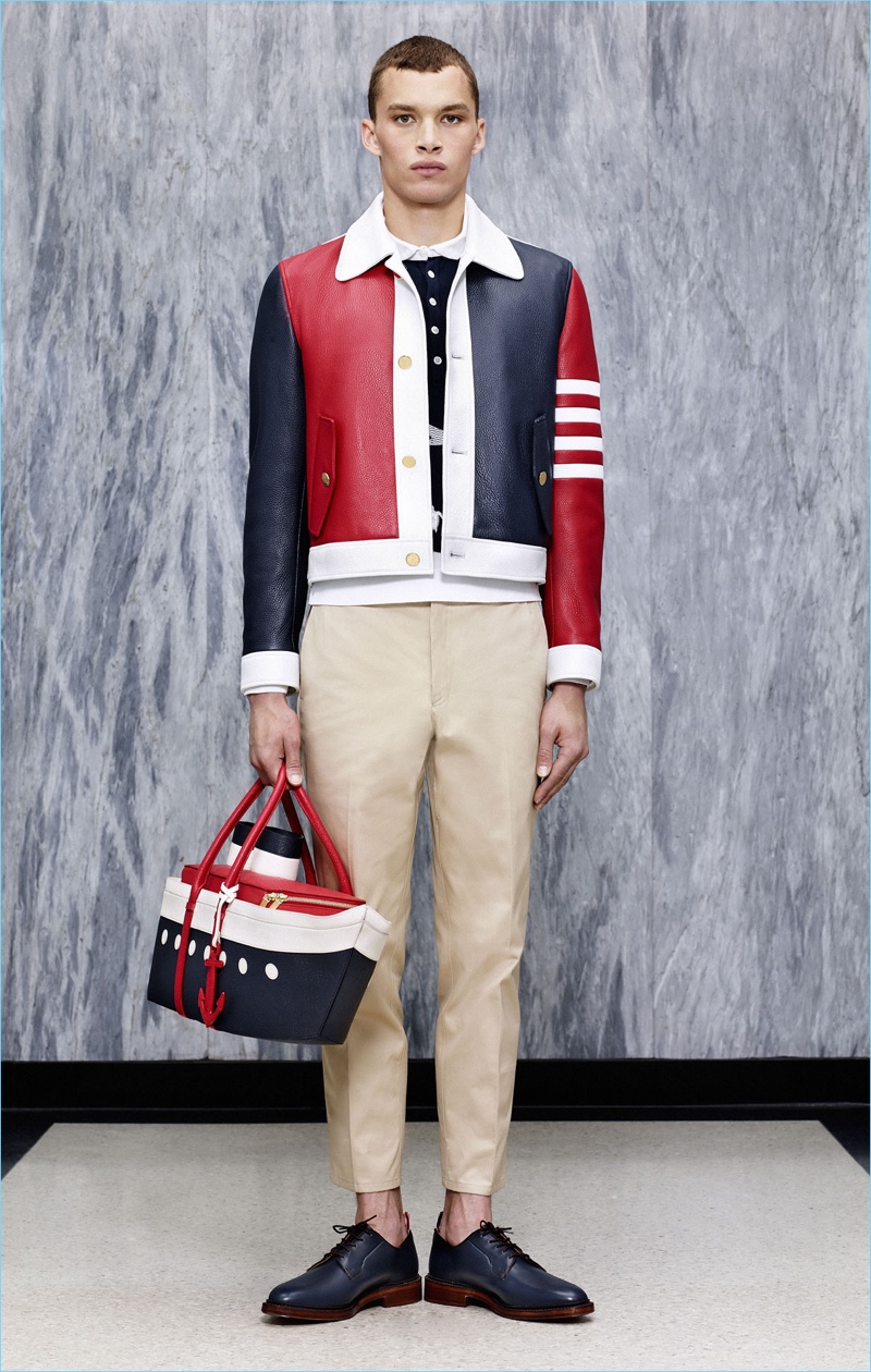 Thom Browne's signature red, blue, and white motif come together for a statement blouson jacket.