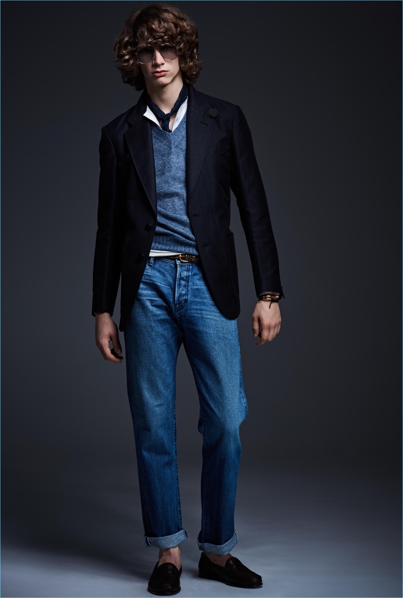 Going casual, Erik van Gils wears denim jeans with a sport coat and v-neck sweater from Tom Ford.