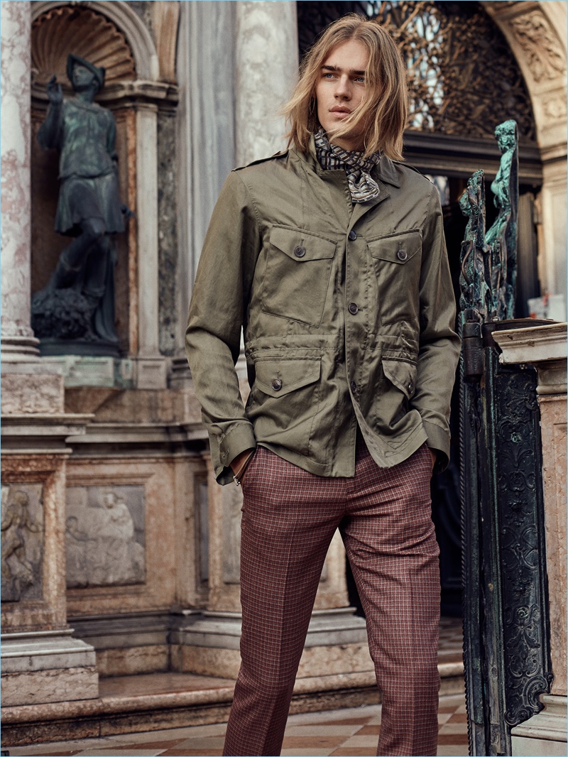 Starring in an editorial for August Man Malaysia, Ton Heukels wears a field jacket and check trousers by Paul Smith. Ton also sports an Ermenegildo Zegna scarf.