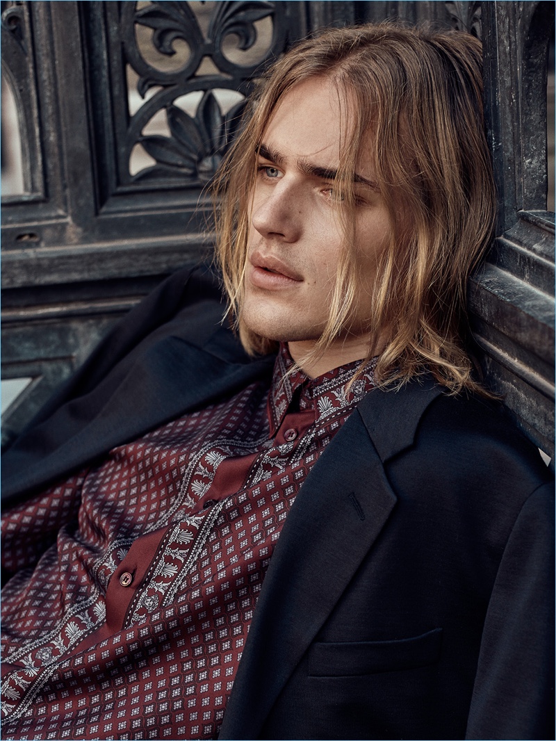 Ton Heukels wears a bandana print shirt and sport coat by Versace.