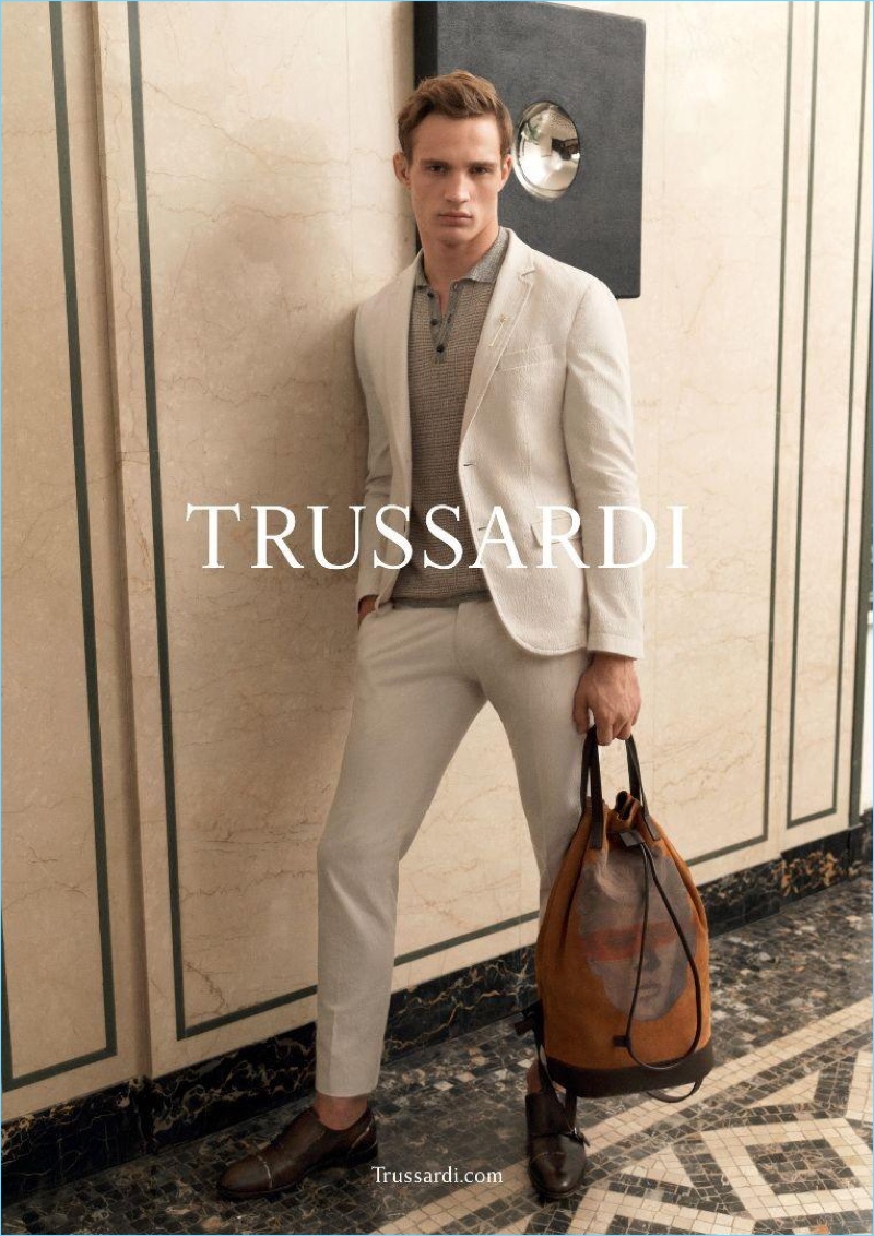 Julian Schneyder dons neutral suiting with a polo for Trussardi's spring-summer 2017 campaign.