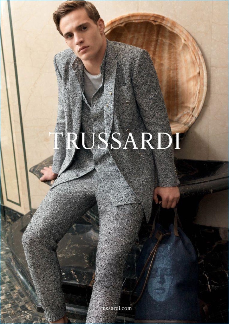 Front and center, Julian Schneyder wears a three-piece suit for Trussardi's spring-summer 2017 campaign.