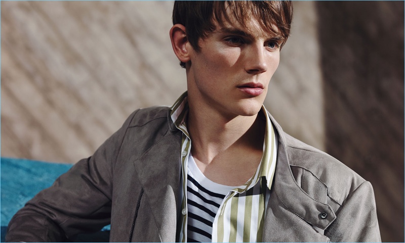 Callum Ward layers Zara fashions with a striped shirt and t-shirt.