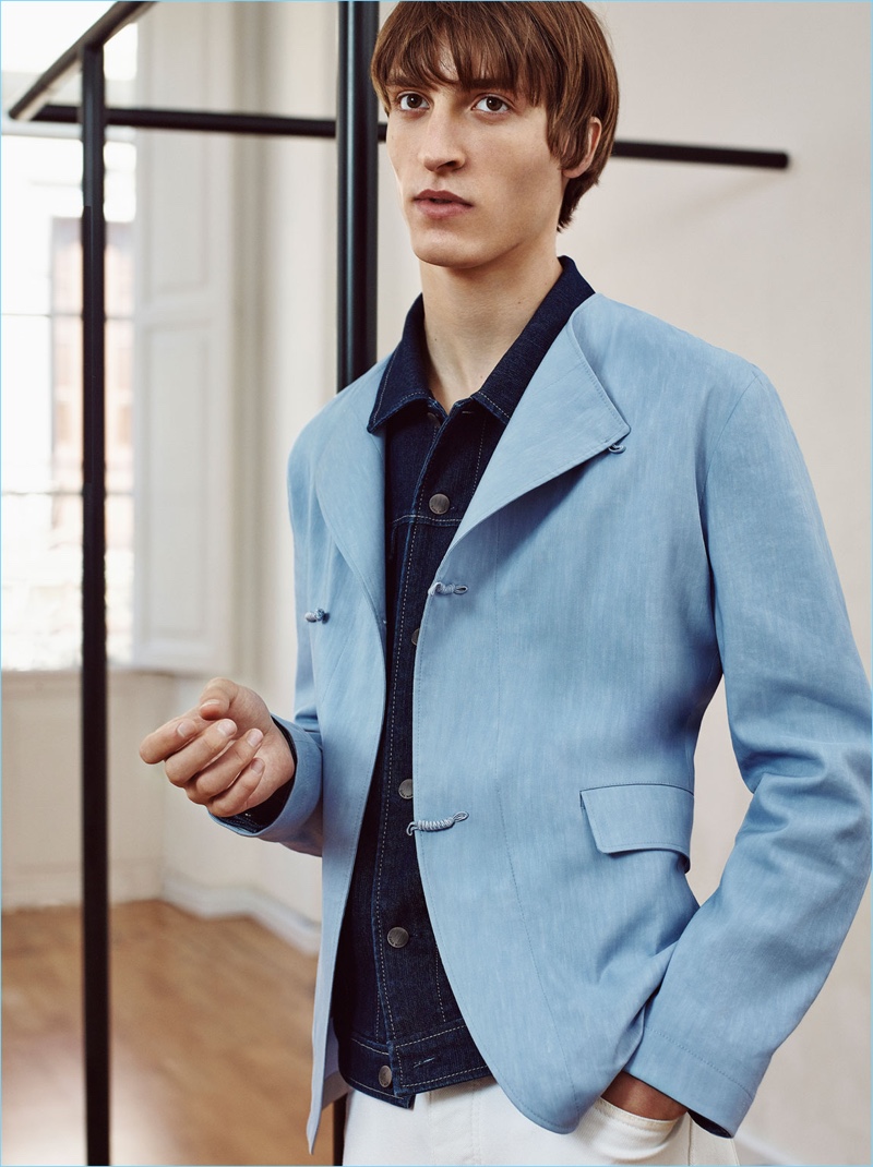 Enjoying a blue style moment, Tim Dibble wears a studio blazer and oversized jeans with a cotton denim jacket from Zara Man.